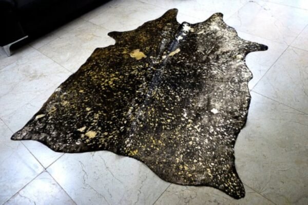 Metallic gold black cowhide rugs