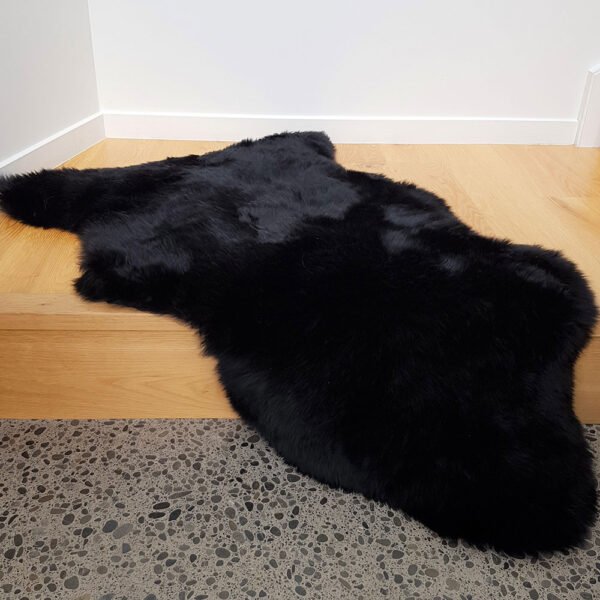 Natural black sheepskin rug